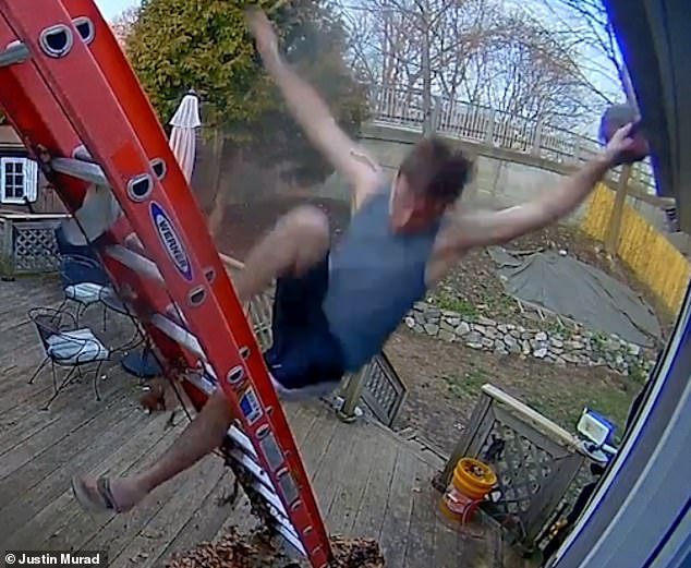 man falling off ladder