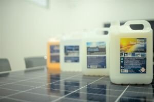 Solar panel cleaning chemicals in tubs